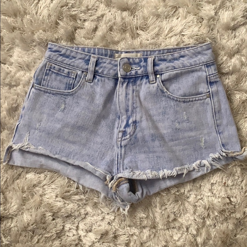 Blue tinted jean shorts